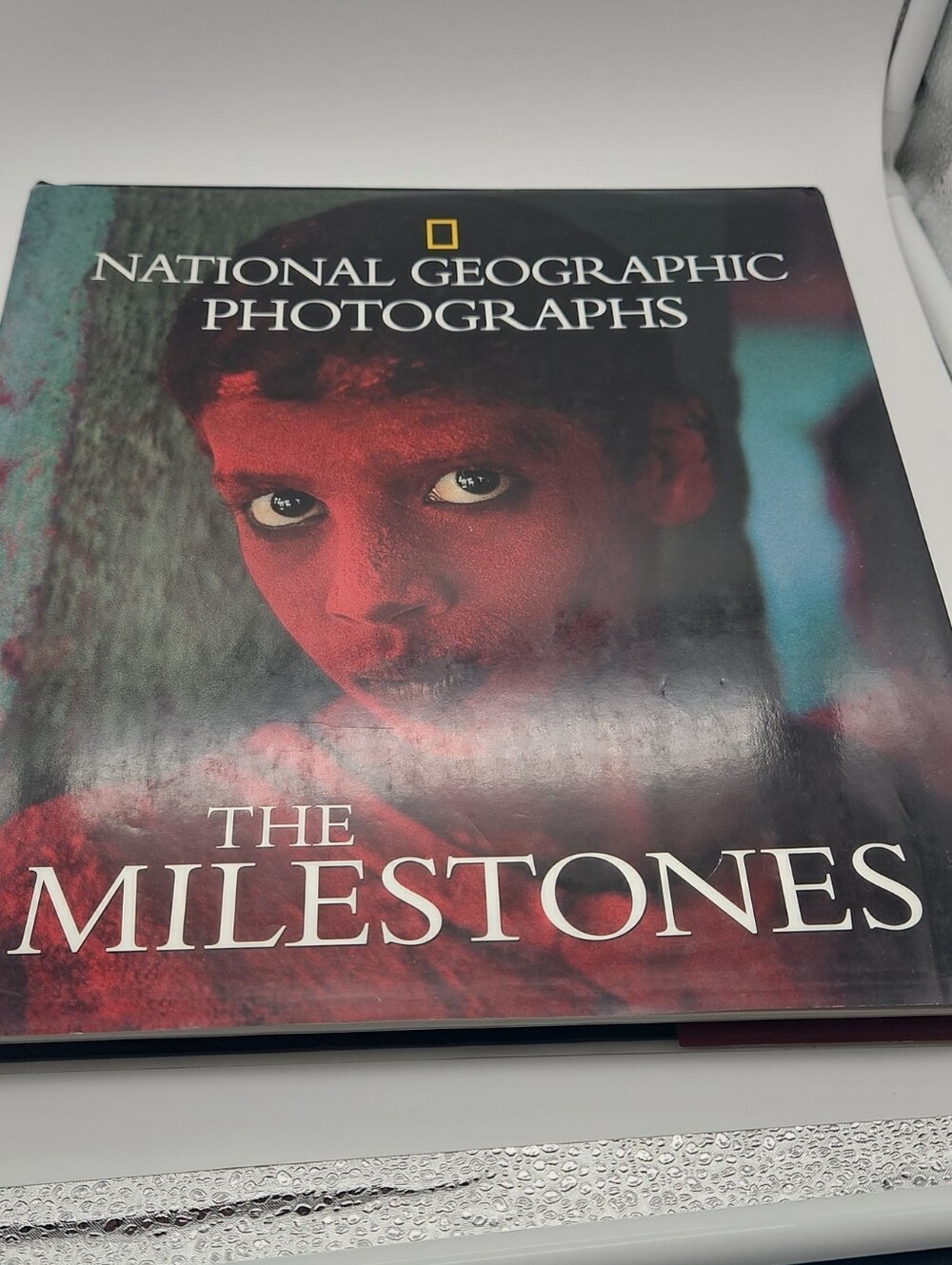 National Geographic Photographs The Milestones - Red and Black Cover